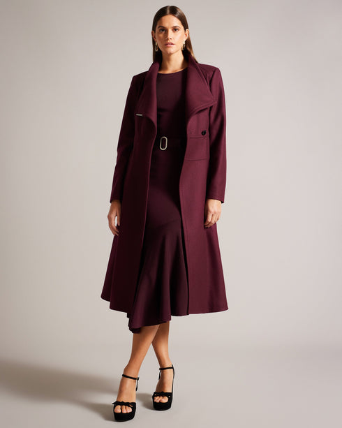 ROSEIKA-Outerwear-Wrap yourself in elegance with ROSEIKA. Our beloved wrap coat gets an upgrade with a full circle skirt and midi length. Featuring a magnetic collar closure and button fastening, this coat offers both style and functionality, so you can embrace chilly weather in style. Wrap coat with full circle skirt Midi length Wool blend Self tie belt Logo engraved hardware tips Magnetic collar closure Button fastening Long sleeves Pockets- Ted Baker Romania